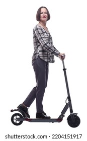 Confident Mature Woman With Electric Scooter Looking At You.