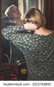 Confident Mature Woman Getting Ready For A Night Out, Dressed Elegantly