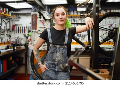 Confident mechanic in bike repair workshop - Powered by Shutterstock