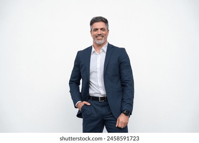 Confident portrait 40s mature successful businessman freelance entrepreneur in suit, copy space. Smiling senior business leader man standing proudly, looking at camera on isolated white background - Powered by Shutterstock