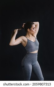 Confident Pose Of Fitness Trainer Portrait. Woman In Sportswear. Strong Beautiful Sportswoman With Make-up. The Owner Of The Gym. Lifestyle. Sportive Curvy Girl With A Muscular Figure. Healthy 