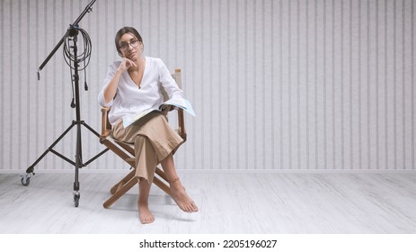 Confident Professional Actress Sitting On The Director's Chair And Holding A Play Script: Drama School And Film Industry Concept, Copy Space