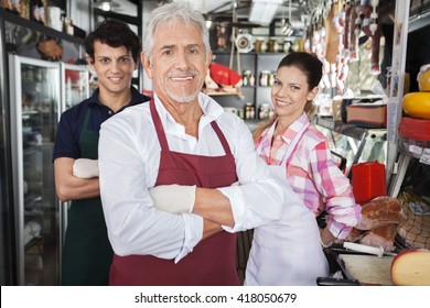 Confident Salespeople In Cheese Shop