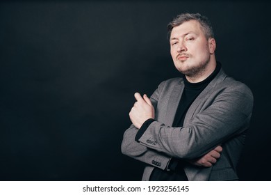 Confident Satisfied Business Man Standing With Crossed Arms Over Black Background With Free Space