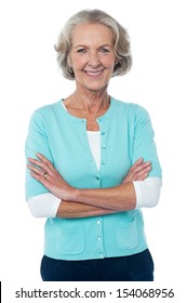 Confident smiling beautiful aged woman in trendy wear