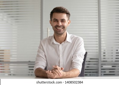 Confident Smiling Businessman Coach Webinar Speaker Looking At Camera Webcam View Recording Video Training Vlog Shooting Media Online Making Conference Call At Workplace, Business Portrait