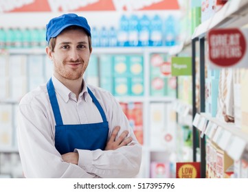 Confident Smiling Supermarket Clerk Posing At The Shopping Mall, Retail Job Concept