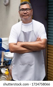 Confident Street Hawker Man Working With His Delicious Meatball Skewer Street Food; Concept Of Asian Street Food, Tourism With Local Food, Small Business, Street Food Hawker