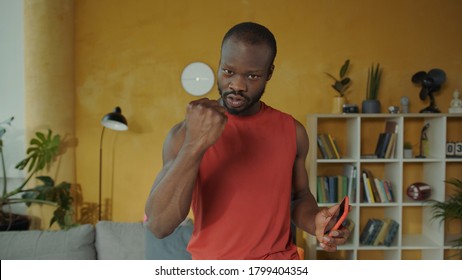 Confident strong african american athlete speaking at camera, saying motivational words, encouraging for healthy lifestyle and sports. - Powered by Shutterstock