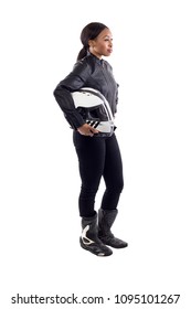 Confident Strong Black Female Holding A Helmet As A Race Car Driver, Motorcycle Biker Or A Stuntwoman.  The Image Depicts Feminism By Portraying A Gritty Woman Of Extreme Motorsports.