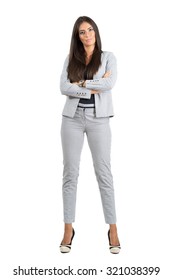 Confident Strong Business Woman With Folded Arms Looking At Camera.  Full Body Length Portrait Isolated Over White Studio Background. 