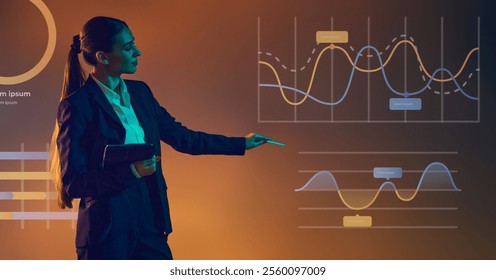 Confident woman explains complex data, backed by colorful visual graphs on large screen. Neon light. Concept of presentation, training, meeting, leadership, analysis. Copy space for ad.