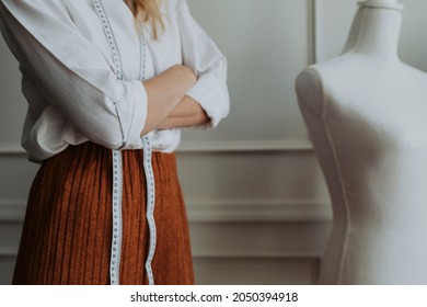 Confident Woman In Fashion Industry Standing With Arm Crossed