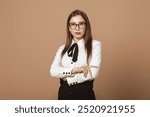 Confident Woman in Power Pose. Attractive Lady Standing with Crossed Arms on Chest. Empowerment, Confidence and Leadership Concept. Ideal for Business, Leadership, and Personal Development Themes