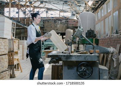 Confident Woman Working As Carpenter In Her Own Woodshop