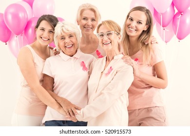 Confident women conducting campaign against breast cancer - Shutterstock ID 520915573