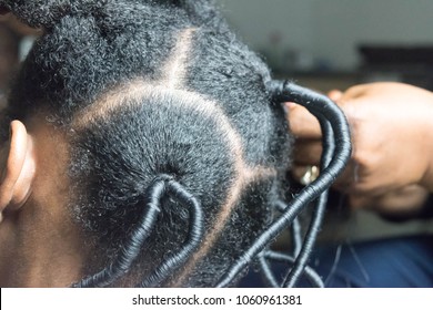 Confident Young African American Girl With Long Curly Kinky Hair Threading Ethnic Hairstyles For Afro Hair Growth, A Girl In Beauty Salon For African Style, Stylized Hairstyles Almost Done In Progress