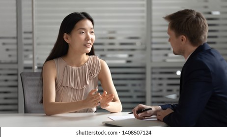 Confident Young Asian Businesswoman Applicant Manager Talk To Hr Employer Consulting Customer At Job Interview Meeting, Korean Seeker Speak To Recruiter Client At Hiring Negotiation Business Advice