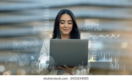 Confident young professional woman using a laptop, overlayed with dynamic financial charts and data analytics, represents the modern multitasking businessperson. Work, successful business - Powered by Shutterstock