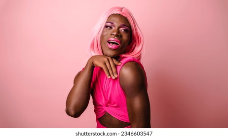 Confident Young Transgender Woman's Joyful Portrait on pink background - Powered by Shutterstock