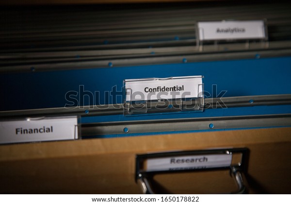 Confidential filing drawer
with documents