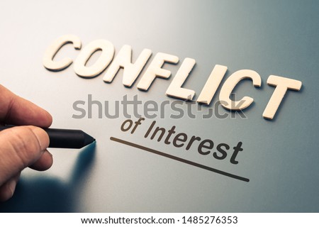Conflict of Interest, hand writing text attach the letters word to complete concept