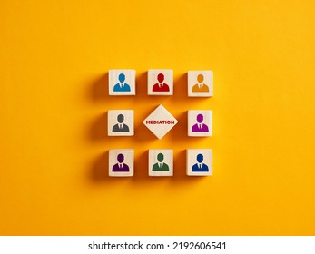 Conflict Resolution And Mediation Concept. Dispute Settlement And Resolution By The Third Party Intermediary Mediator. The Word Mediation Surrounded By Business Person Icons On Wooden Cubes.