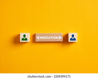 Conflict Resolution And Mediation Concept. Dispute Settlement And Resolution By The Third Party Intermediary Mediator. The Word Mediation On Wooden Block With Business Person Icons On Wooden Cubes.

