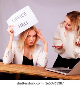 Conflicts Of Office As Risk For Business. Conflict Between Two Female Colleagues. Female Worker Holds Sign OFFICE HELL.