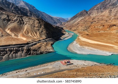 Confluence of the Indus and Zanskar Rivers are two different colors of water , between Kargil and leh,India