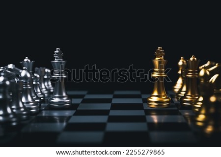 the confrontation between the golden King chess and silver king chess, planning, management, leadership or business success concept