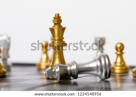 The confrontation between the two chess pieces, the failure and admit defeat, the fallen chess pieces