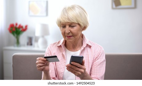 Confused Aged Woman Credit Card Smartphone Stock Photo 1492504523 ...