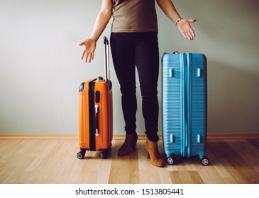 Confused Air Passenger Standing With Luggage, Stranded In Airport. Traveling Agency Bankruptcy Concept.