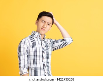 Confused Asian Young Man Thinking