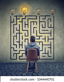 Confused business man brainstorming the labyrinth has a solution - Shutterstock ID 1044440701