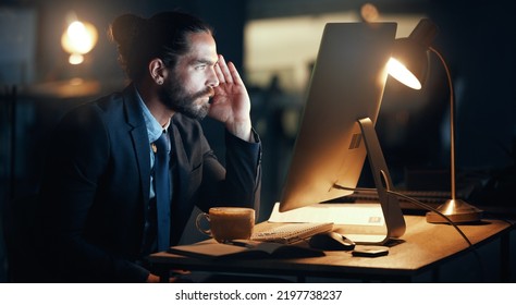 Confused, business man and computer stress while finishing work deadline at night with pc glitch. Corporate male with anxiety about target working at desk screen late to complete urgent task. - Shutterstock ID 2197738237