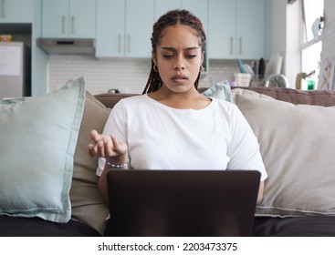 Confused Business Woman With Laptop Online 404 Error, Technology Fail Or Network Connection In Her Home. Young Entrepreneur With Digital Problem, Email Mistake Or Job Stress Working On Pc And Sofa