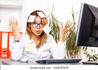 confused business woman with sticky notes on her face