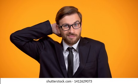 Confused Businessman Scratching Head, Hopeless Situation, Lack Of Knowledge