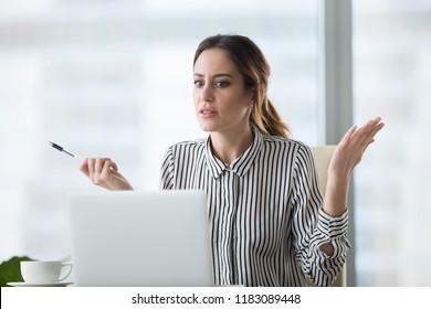 Confused Businesswoman Feel At Loss Looking At Laptop Screen With Error Message, Frustrated Female Worker Shocked By Computer Malfunction Or Online Problem, Seeing Notice About Pc Crash Or Bad News