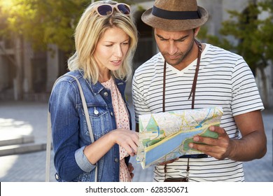 Confused City Couple Reading Map