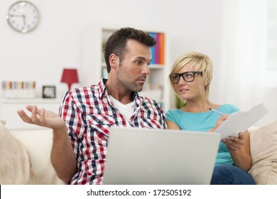 Confused Couple Doing Their Accounts 