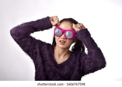 Confused And Dizzy Asian Woman Wear Funny Glasses, Girl's Face Expression Feeling Worry Messy Problems On Isolated White Background.