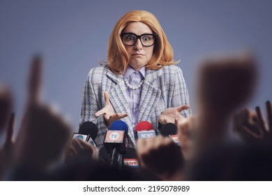 Confused Embarassed Female Politician Holding A Press Conference, She Is Talking To The Media