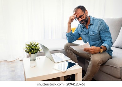 Confused Frustrated Mature Man Holding Mail Letter And Money, Reading Shocking Unexpected News Nonsense In Paper Document, Mad About High Bill Tax Invoice, Debt Notification, Money Problem.