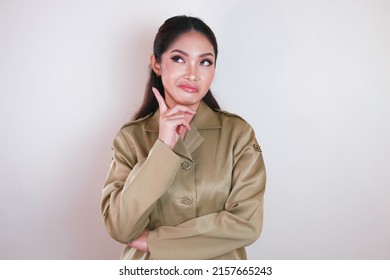 Confused Government Worker Women Have Thinking Gestures. PNS Wearing A Khaki Uniform.