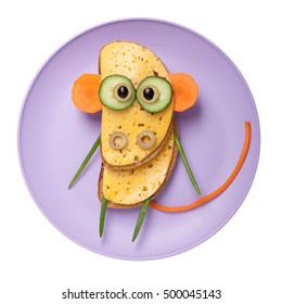 Confused Monkey Made Of Bread And Vegetables On Plate