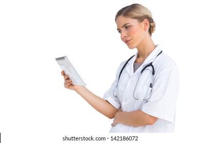 Confused Nurse Holding Tablet Pc On White Background