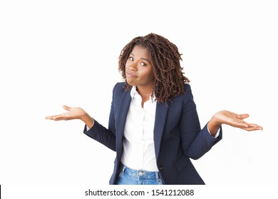 Confused Office Worker Making Clueless Gesture. Young African American Business Woman Standing Isolated Over White, Looking At Camera, Shrugging. Do Not Know Concept